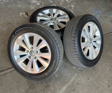 Genuine vw golf 16" alloy wheels with like new tires.