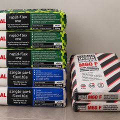 Tile adhesive and M60