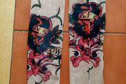 2 fake tattoo sleeves.
