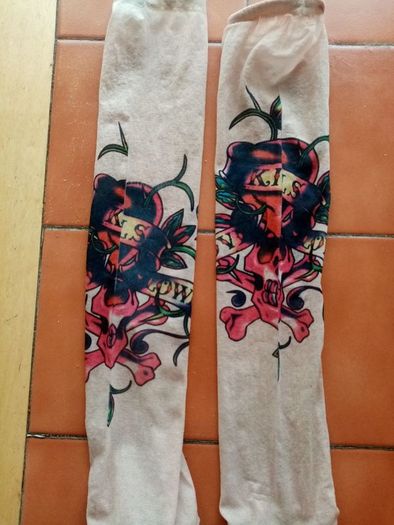 2 fake tattoo sleeves.
