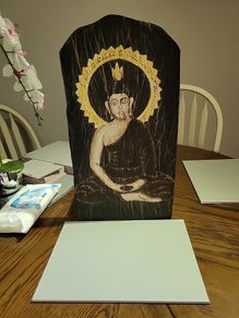 Buddha on wood