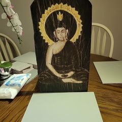 Buddha on wood
