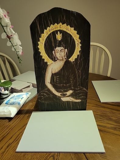 Buddha on wood