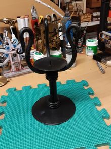 Cast iron candle holder