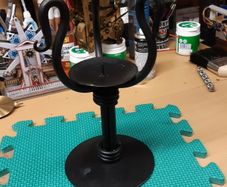 Cast iron candle holder