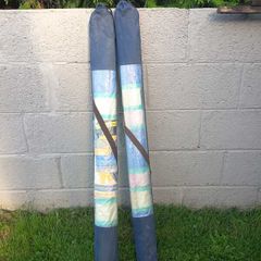 Pair of windbreaks with blue carry covers