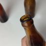 257 - Set of 3 Vintage Brown Glass Scanlan Cades Jennings Collectible Decorative Mineral Water Beer Bottles Image 7