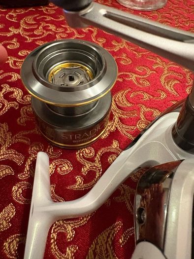shimano stradic 4000 with spare spool and spiderwire braid