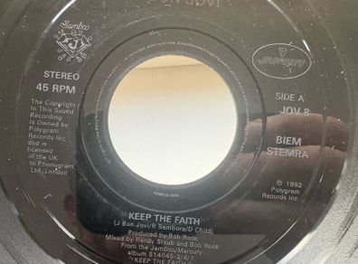 Bon Jovi. Keep The Faith. Seven inch jukebox large hole single. Etched label and backed with I wish every day could be like Christmas. Plays great. No cover.