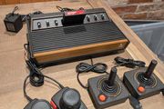 Immaculate Atari 2600 with Two joysticks and Two paddles and Centipede game
