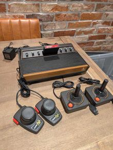 Immaculate Atari 2600 with Two joysticks and Two paddles and Centipede game