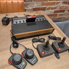 Immaculate Atari 2600 with Two joysticks and Two paddles and Centipede game