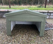 lawnmower house