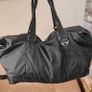 Large black expandable travel bag with shoulder strap Image 4