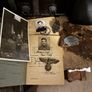 WW2 German documents with an eagle pin and an identification tag for one soldier Image 2