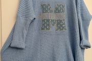 Delightful Blue Sloppy Joe jumper with shiny motif