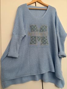 Delightful Blue Sloppy Joe jumper with shiny motif