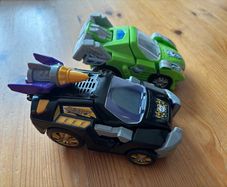 Two V-Tech Switch & Go Dinos