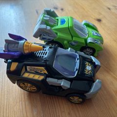 Two V-Tech Switch & Go Dinos