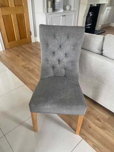 Solid oak dining table and chairs