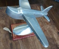 Art Deco style polished vintage aluminum airplane desk model,