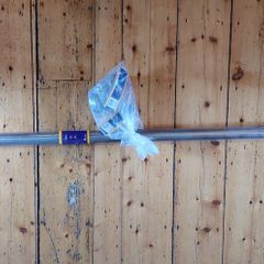 Large 'antique brass' curtain rail and 12 rings