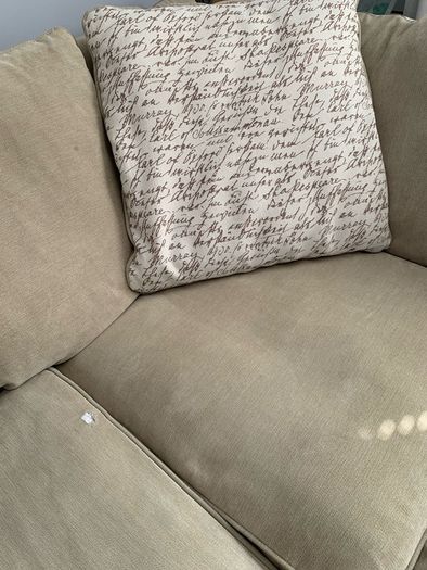 Corner sofa with footstool