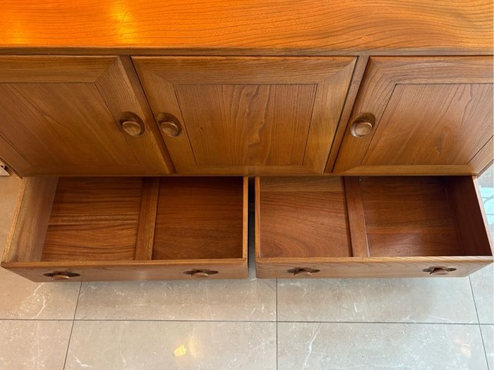 Ercol - elm and beech 'Windsor' model 468 sideboard,