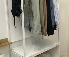IKEA open wardrobe with hanging rail and shelving - white