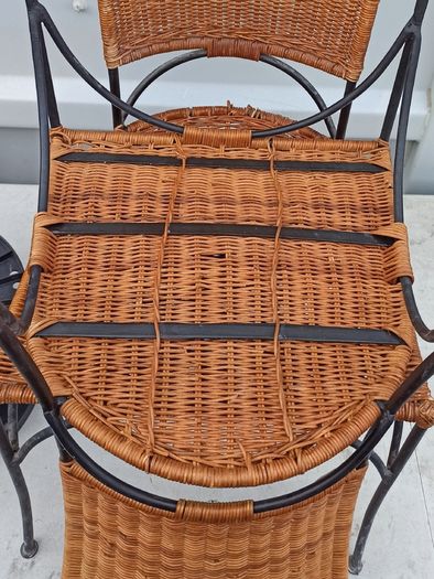 Two vintage wicker and wrought iron chairs