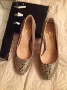 Size 5 brand new tan print love them but can't wear heels anymore