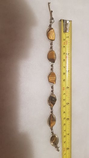 tiger eye bracelet,,good condition,buyer collects or pays postage, thank you, take as is,see pictures for condition