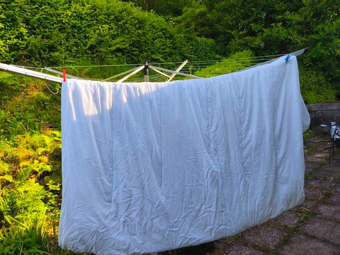 two double duvets, coffee stained but good for pets
