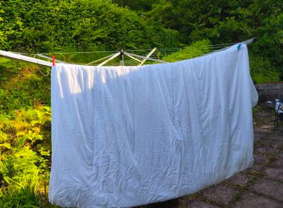 two double duvets, coffee stained but good for pets