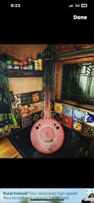 THE ROUGHNECK Fretless hand carved African neck with a vintage Hunters biscuit tin