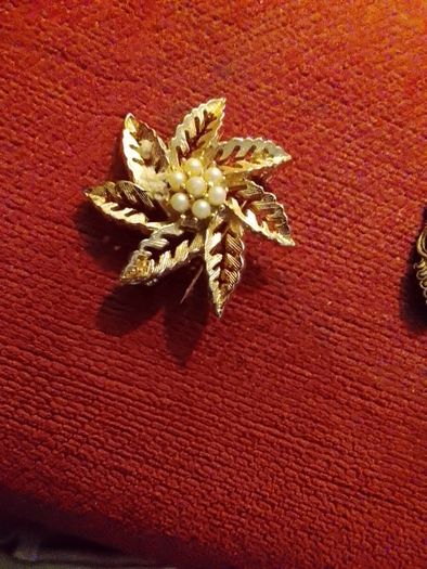 Gold plated brooches