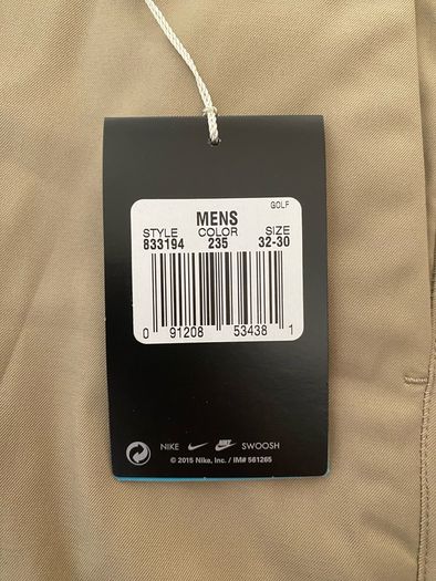 Beige Nike Golf trousers