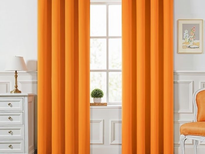 Blackout Curtains Orange Eyelet 2 Panels 46x90 in  Thermal insulated blackout fabric for bedrooms and living rooms; helps block light and reduce heat.