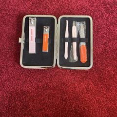 Nail cutter with a little purse