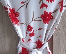 evita satin look top with flowers pattern size fits Xs s