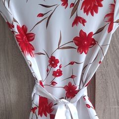 evita satin look top with flowers pattern size fits Xs s