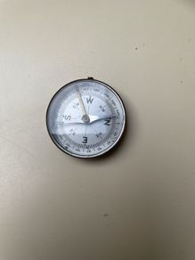 Antique brass locking compass