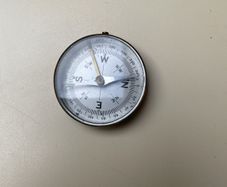Antique brass locking compass