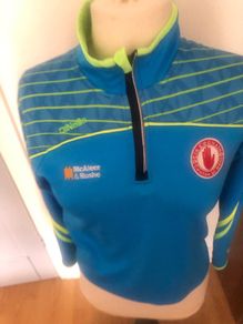 Signed Tyrone half zip gaa aged 12-13