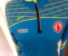Signed Tyrone half zip gaa aged 12-13