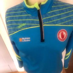 Signed Tyrone half zip gaa aged 12-13