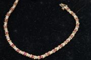9ct yellow gold diamond and ruby bracelet
