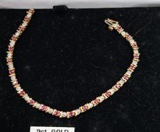 9ct yellow gold diamond and ruby bracelet