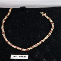 9ct yellow gold diamond and ruby bracelet