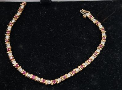 9ct yellow gold diamond and ruby bracelet